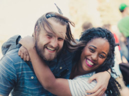 Two friends hugging